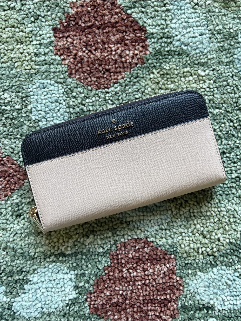 kate spade two-tone black and cream zip-around wallet